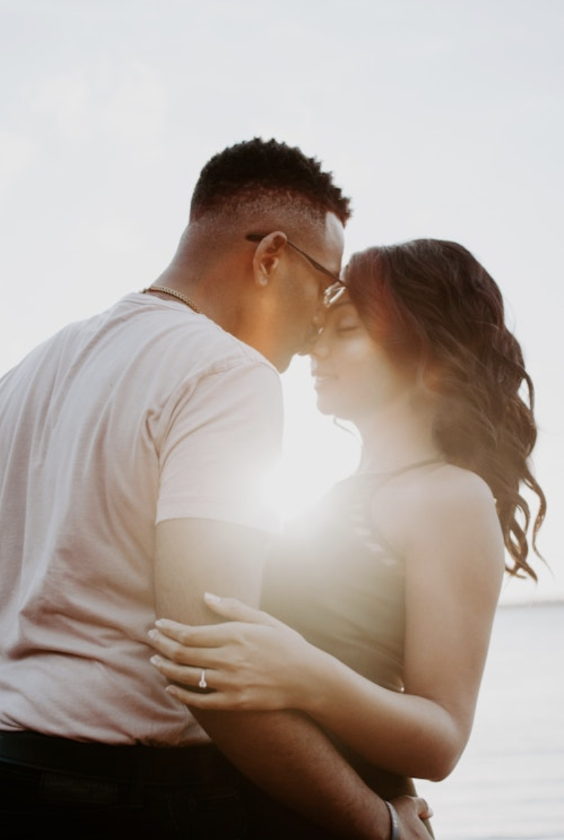 Black married couple embracing